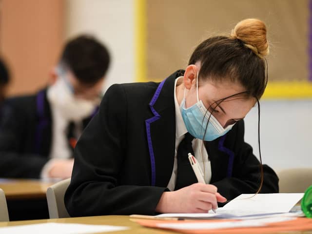 Pupils wearing face coverings in school. Photo by Getty Images