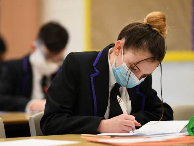 Pupils wearing face coverings in school. Photo by Getty Images