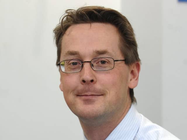 Dr Tim Dalton