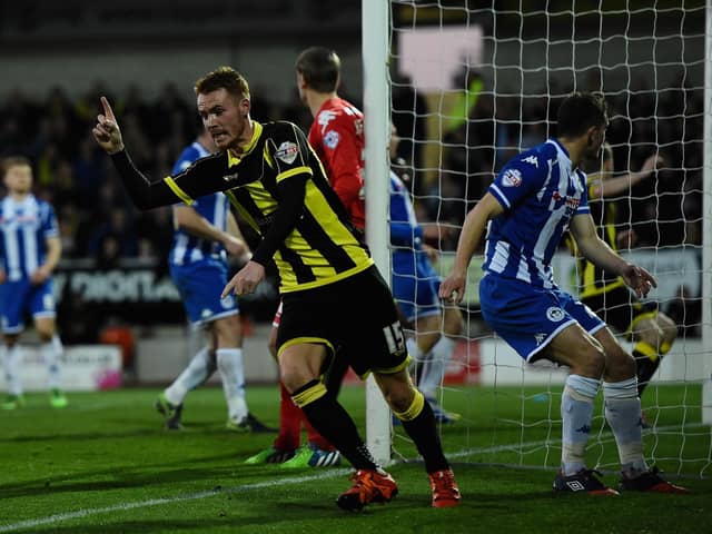 Tom Naylor scores against Latics for Burton back in 2016