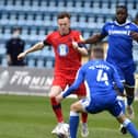 George Johnston in action for Latics