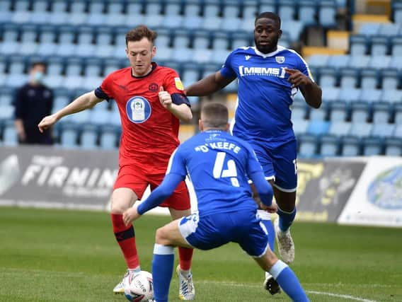 George Johnston in action for Latics