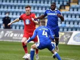 George Johnston in action for Latics