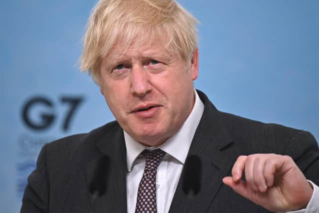 British Prime Minister Boris Johnson takes part in a press conference on the final day of the G7 summit in Carbis Bay on June 13, 2021 in Cornwall.