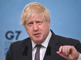 British Prime Minister Boris Johnson takes part in a press conference on the final day of the G7 summit in Carbis Bay on June 13, 2021 in Cornwall.