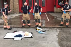 Firefighters refresh their CPR skills