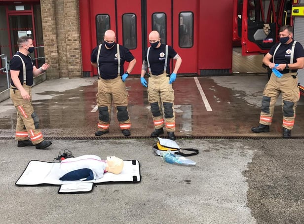 Firefighters refresh their CPR skills