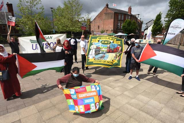 Members of the Wigan Palestinian Solidarity Campaign in Believe Square