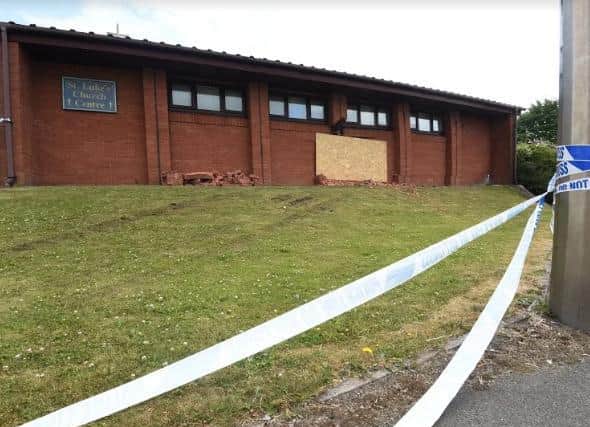 Police tape around St Luke Church Centre in Ashton following the crash