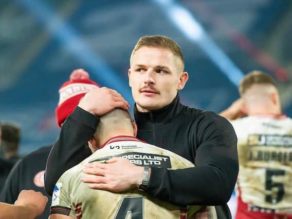 George Burgess comforts Oliver Gildart after the Grand Final