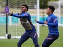 Big-match fever is catching: Marcus Rashford (left) and Jadon Sancho in England training at St George's Park on Thursday