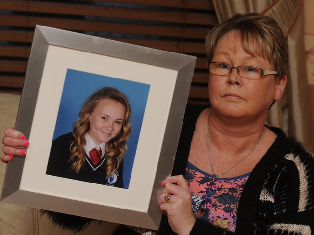Diane Roberts with a photograph of daughter Jemma-Louise Roberts