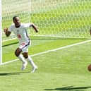 Raheem Sterling celebrates scoring England's winning goal against Croatia.