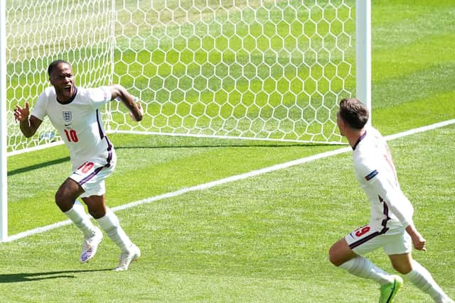 Raheem Sterling celebrates scoring England's winning goal against Croatia.