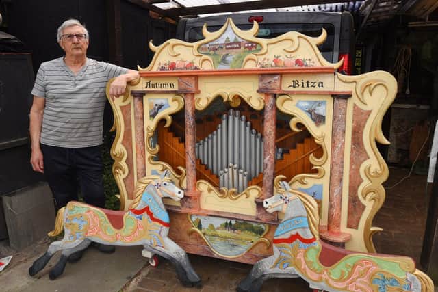 John Ball with the fairground organ he has built to support two local charities