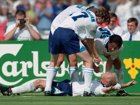 England goalscorer Paul Gascoigne celebrates in the 'Dentists Chair' with Steve McManaman, Alan Shearer and Jamie Redknapp during the 1996 European Championships group stage win over Scotland at Wembley