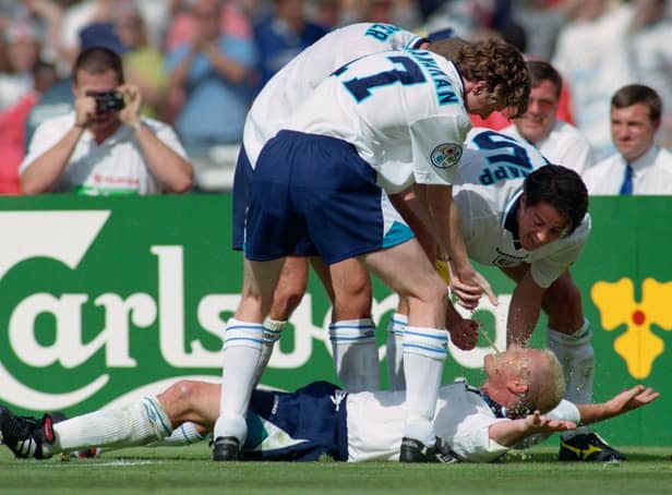 England goalscorer Paul Gascoigne celebrates in the 'Dentists Chair' with Steve McManaman, Alan Shearer and Jamie Redknapp during the 1996 European Championships group stage win over Scotland at Wembley