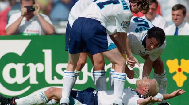 England goalscorer Paul Gascoigne celebrates in the 'Dentists Chair' with Steve McManaman, Alan Shearer and Jamie Redknapp during the 1996 European Championships group stage win over Scotland at Wembley