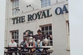 David Greenwood with Wigan RL’s array of trophies outside The Royal Oak pub, Standishgate, more than 30 years ago
