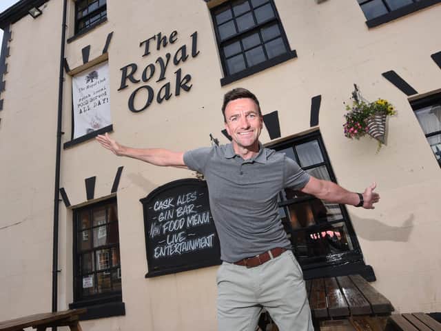 David Greenwood outside the pub recently
