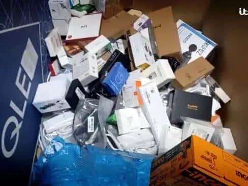 Various technology products ITV found sorted into boxes marked "destroy"