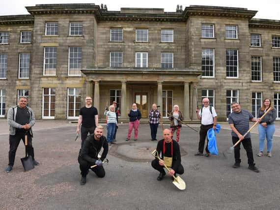 Volunteers get to work at Haigh Hall
