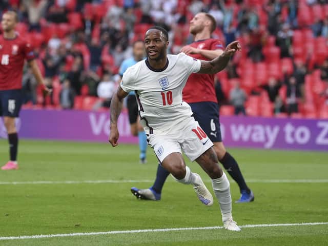 Raheem Sterling celebrates his early goal which settled the match against the Czech Republic