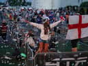 Fans watch the UEFA Euro 2020 Group D match between Czech Republic and England at the 4TheFans fan park in Manchester