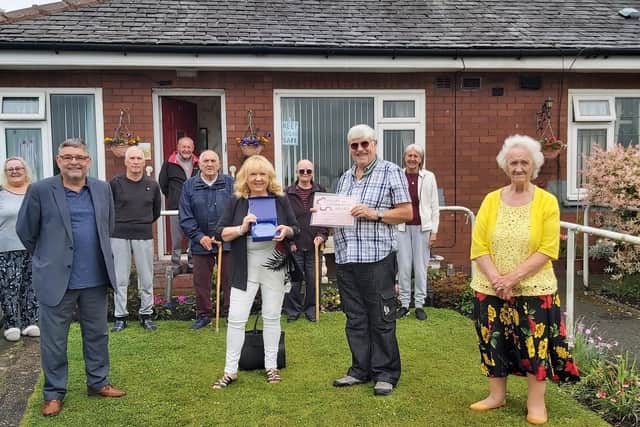 John Kay receiving the Heart of the Community award