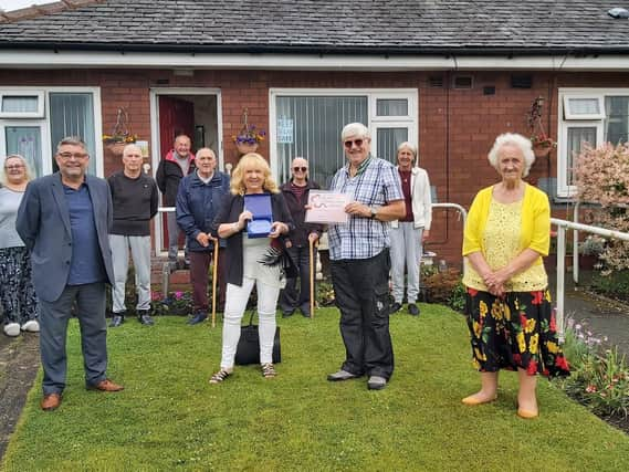 John Kay receiving the Heart of the Community award