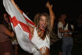 Fans at Ince Rose Bridge Sports and Community Club, Ince, Wigan.