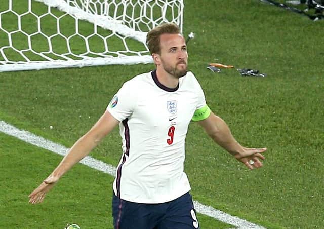 Kane celebrates after making it 3-0