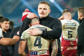 Oliver Gildart is consoled by George Burgess after last year's Grand Final