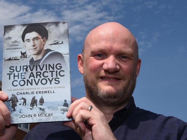 John McKay with his latest book