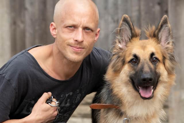Joseph Turpin with his German Shepherd Narla, who was treated by PDSA vets after eating 500g of chocolate with raisins