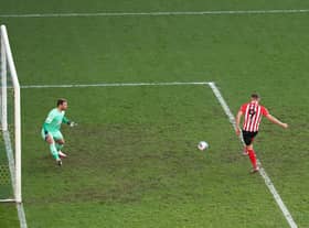 Charlie Wyke scores against Latics for Sunderland at the end of last season