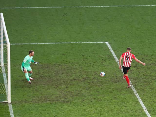 Charlie Wyke scores against Latics for Sunderland at the end of last season