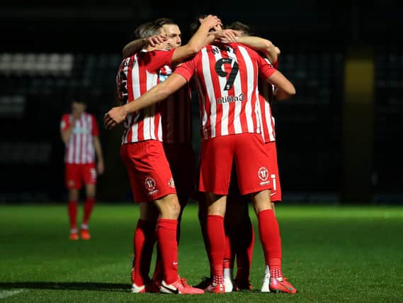 Max Power congratulates Charlie Wyke after scoring for Sunderland