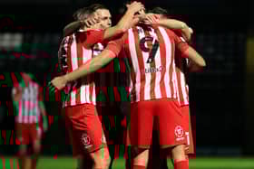 Max Power congratulates Charlie Wyke after scoring for Sunderland