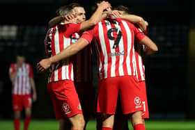 Max Power congratulates Charlie Wyke after scoring for Sunderland