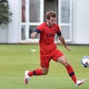 Callum McManaman training with Latics last summer before his move to Australia