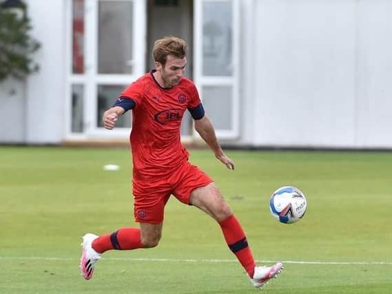 Callum McManaman training with Latics last summer before his move to Australia