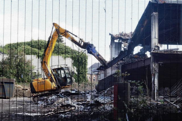 Demolition of part of the mill to make access to intruders harder