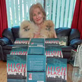 Author Julie Conrad has published her debut novel High Places