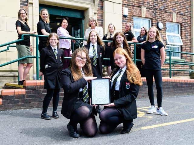 Staff and pupils at Bedford High School with the Artsmark Platinum Award
