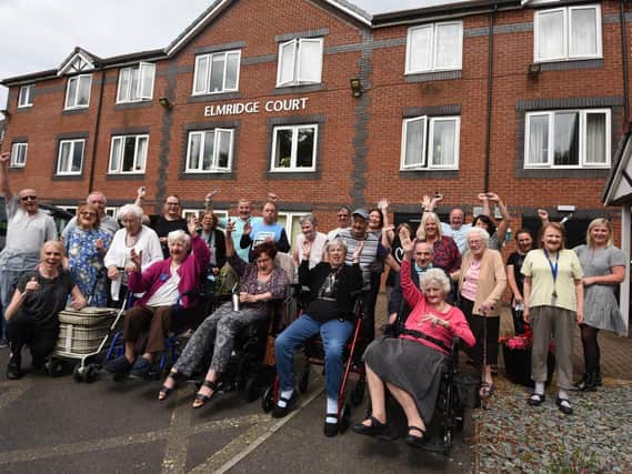 Staff and residents at Elmridge Court celebrating the Most Innovative Setting award