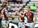 Harry Smith celebrates his try which put Wigan in front