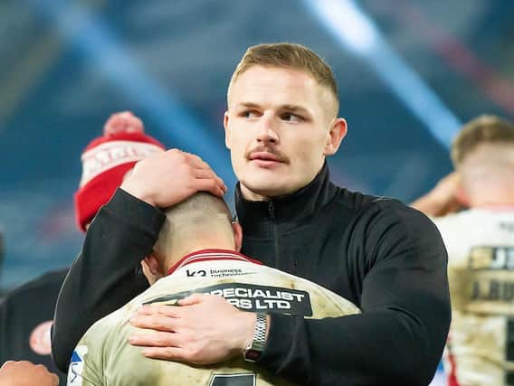 George Burgess consoling Oliver Gildart at the Grand Final