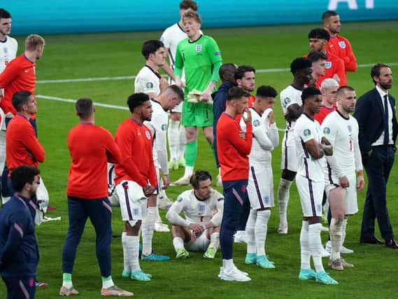 A dejected England side after the penalty shootout at Wembley