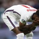 Marcus Rashford reacts after missing his penalty